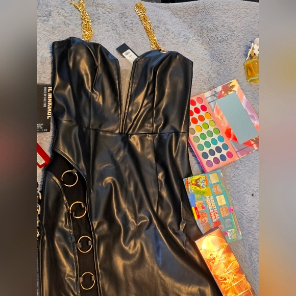 Black dress with gold rings on open leg side. Size Medium & Large. - Picture 4 of 6